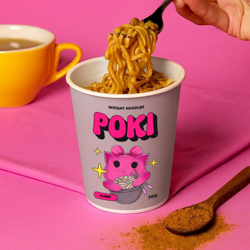 Pink Poki curry instant noodle cup with a fork lifting noodles